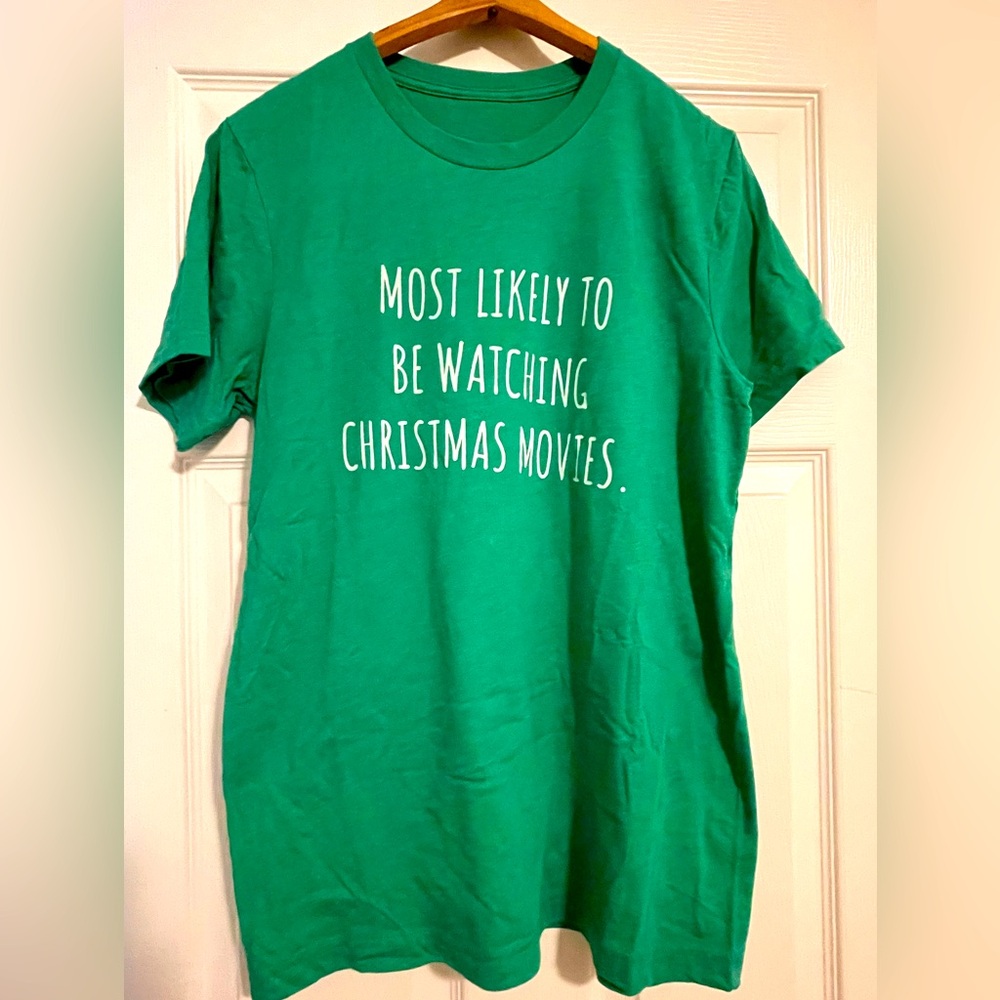 The Home T green t-shirt “Most Likely to be Watching Christmas Movies”